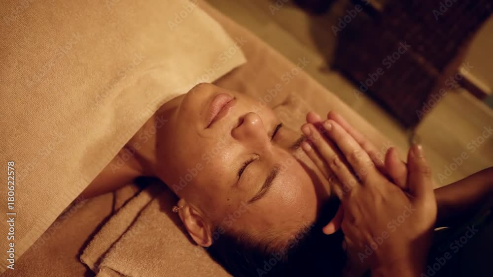 Charming woman is having a medical procedure at spa. Charming woman is having a medical procedure at spa.