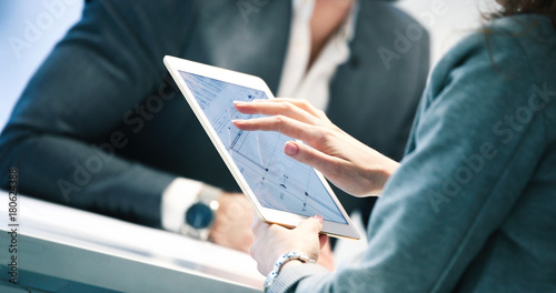 Close up picture of businessman using tablet