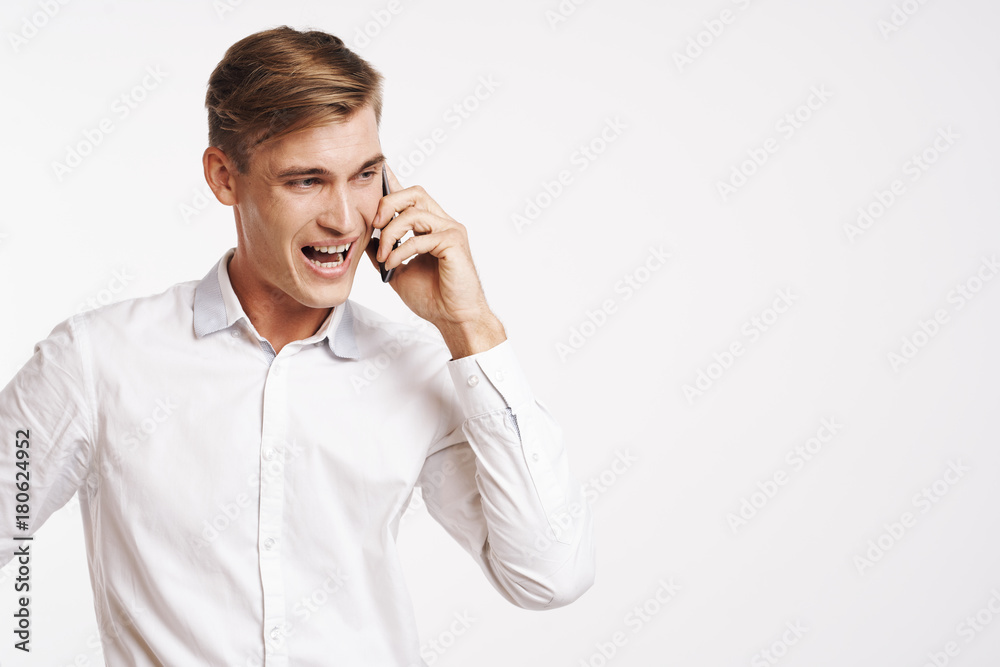 business man talking on the phone and unhappy business man talking on the phone and unhappy