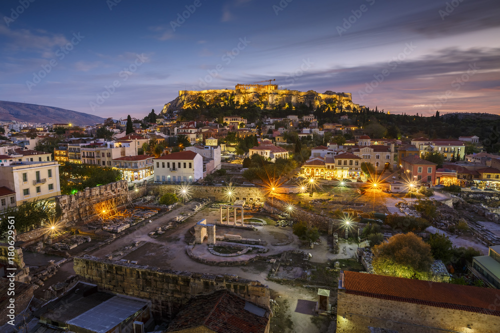 View of Acropolis from a roof top coctail bar at sunset, Greece. 
