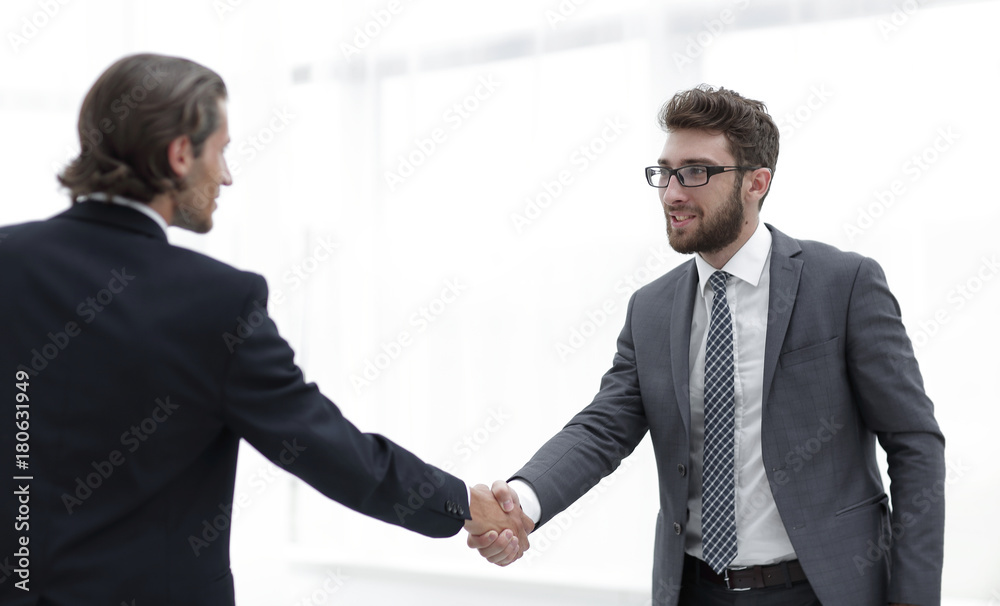 welcome and handshake of business partners