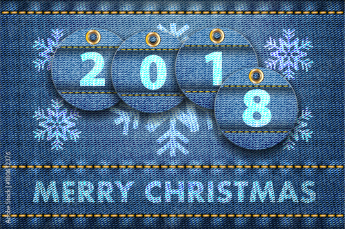 2018 year digits and Merry Christmas greetings on blue jeans background