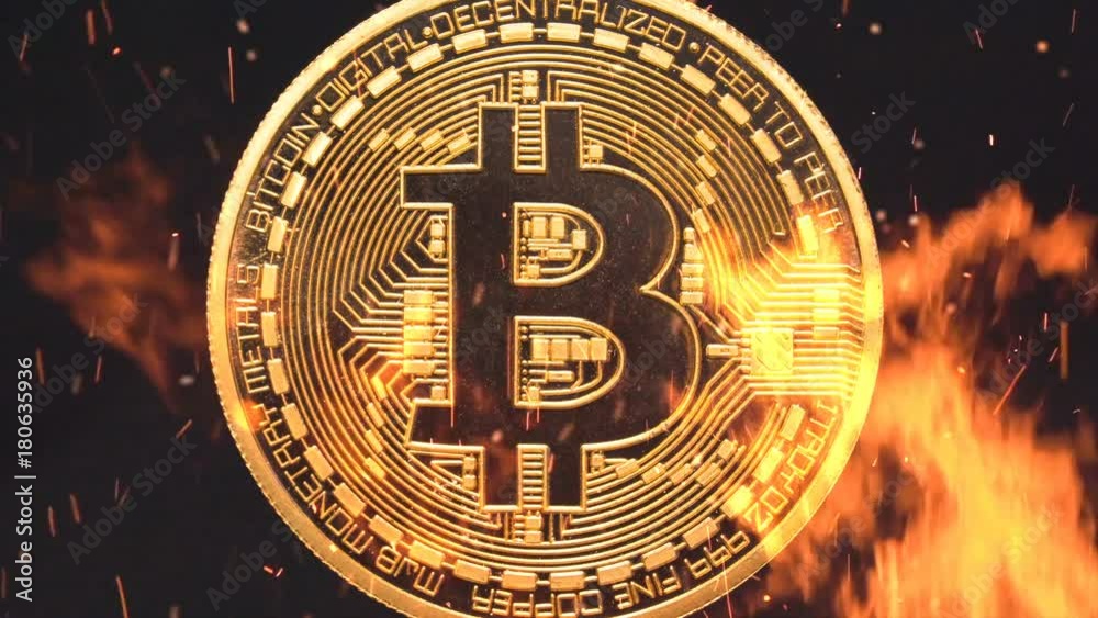 Bitcoin - bit coin BTC cryptocurrency money burning in flames and fire sparkles