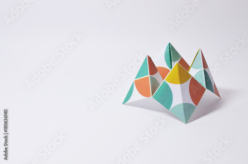colorful origami fortune teller on white background