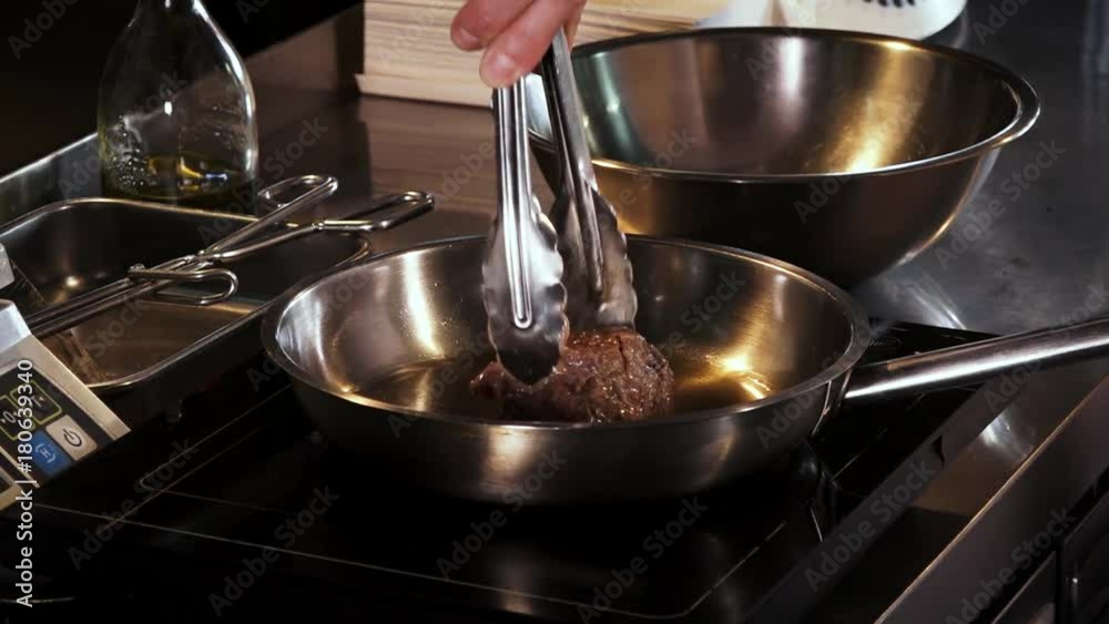 Steaks are cooked in a skillet Steaks are cooked in a skillet