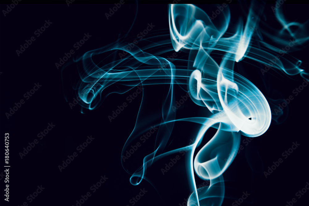 Swirls of blue smoke on a black background Swirls of blue smoke on a black background