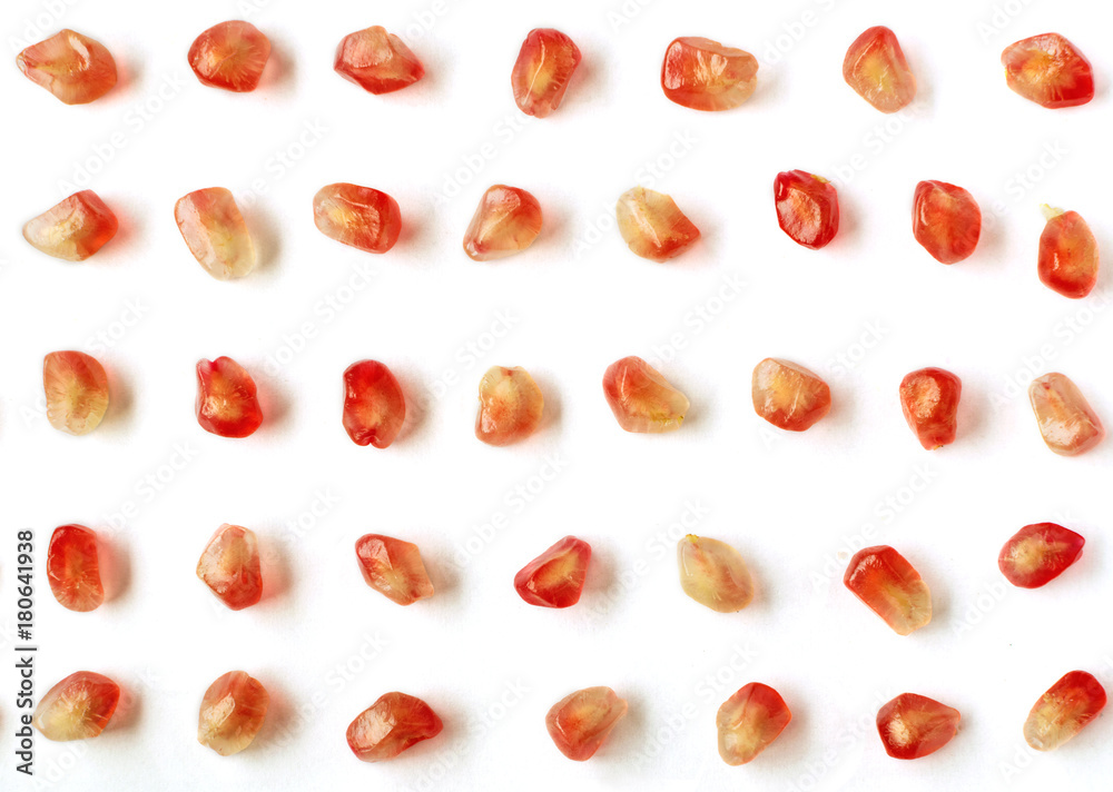Pomegranate seeds on white Pomegranate seeds on white