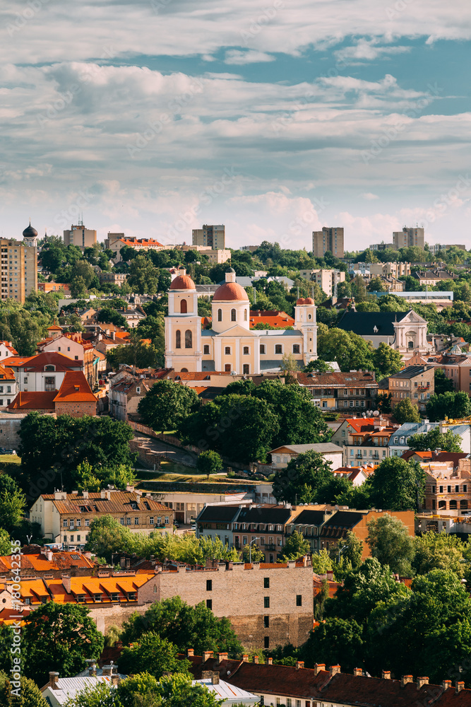 Vilnius, Lithuania. Bastion Of Vilnius City Wall And Orthodox Church Of The Holy Spirit In Summer Day. Vilnius Old Town