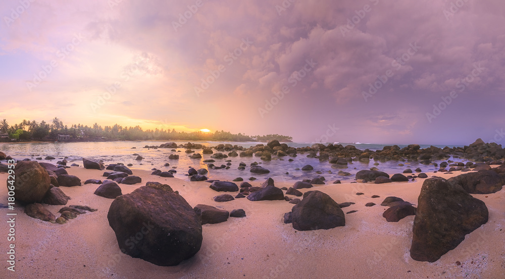 Tropical beach on sunset