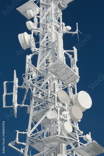 Transmitter tower frozen in winter frost