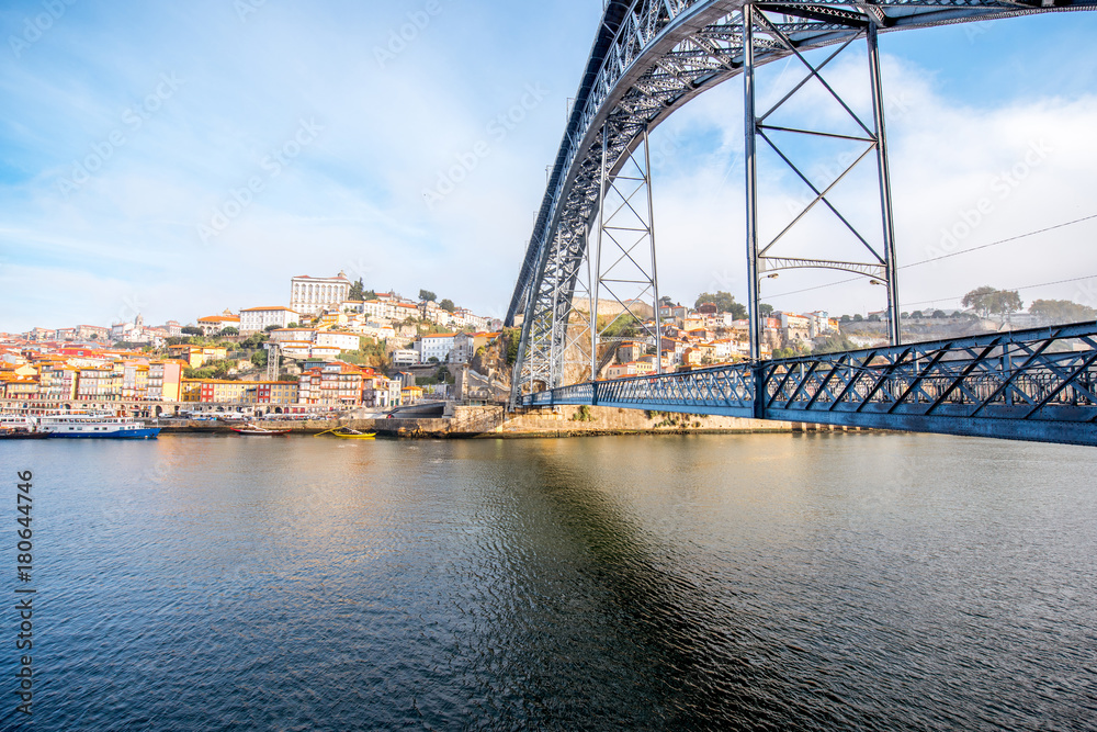 Naklejka premium View on the famous Luis iron bridge during the morning light in Porto, Portugal