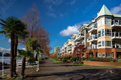 Promenade  quay at Residential District in New Westvinster, beautiful sunny day, autumn. © Alex Lyubar