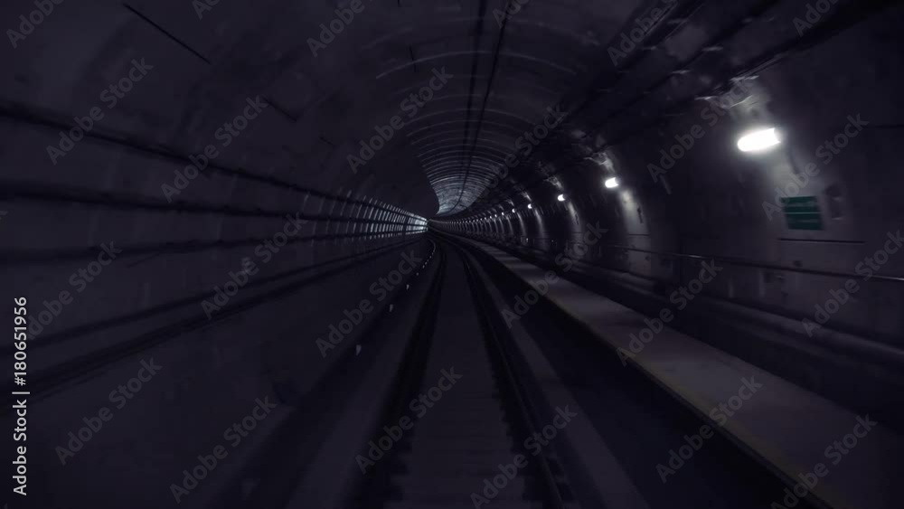 Fast underground train riding in a tunnel in Kuala Lumpur, Malaysia Fast underground train riding in a tunnel in Kuala Lumpur, Malaysia