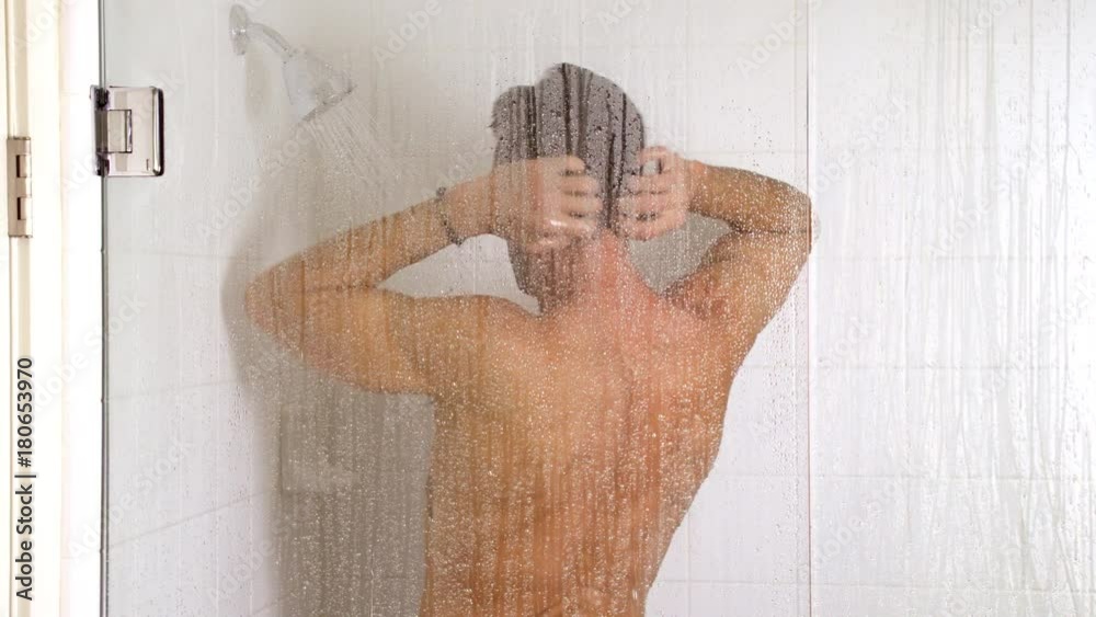 Athletic man in the shower.