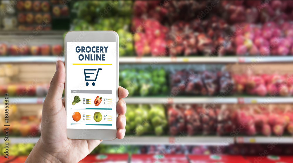 grocery shopping at upermarket mall grocery store vegetable healthy food  smart phone online supermarket Photos | Adobe Stock