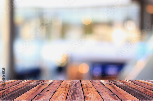 blur of the coffee shop,restaurant and the texture of the brown wood . © manit