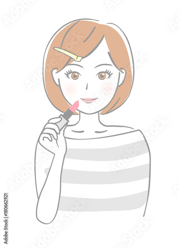 化粧する女性　口紅