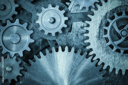 cogs and gears blue metal background