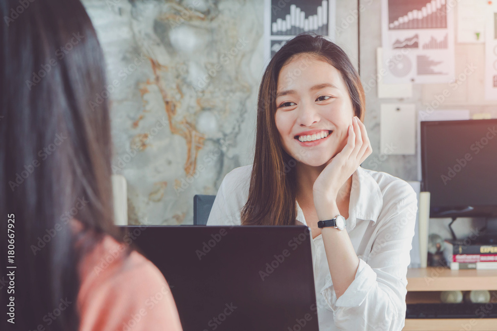 Beautiful young Asian girl and businesswoman meeting & interview at a HR office. Concept of Finding a good job.Vintage tone.