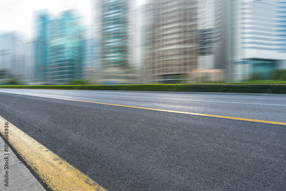 Empty asphalt road through modern city in Shanghai, China. Empty asphalt road through modern city in Shanghai, China.