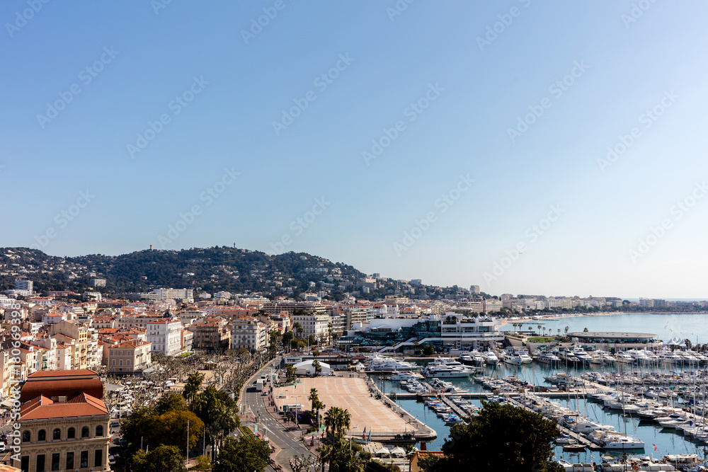 view on french riviera with yachts in Cannes city