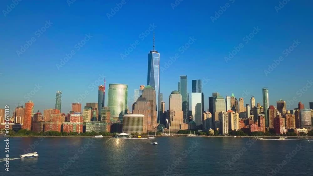 Pullback reveal video: Aerial cityscape view of New York City, One World Trade Center and Lower Manhattan