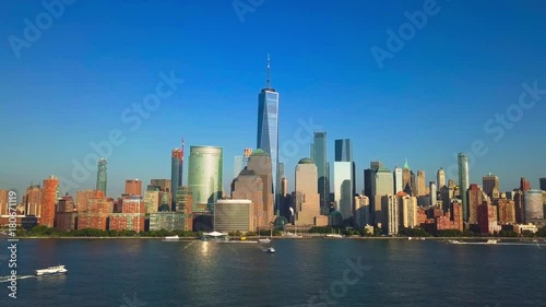 Pullback reveal video: Aerial cityscape view of New York City, One World Trade Center and Lower Manhattan