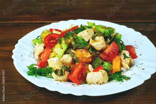 Warm salad with pumpkin , chicken and vegetable