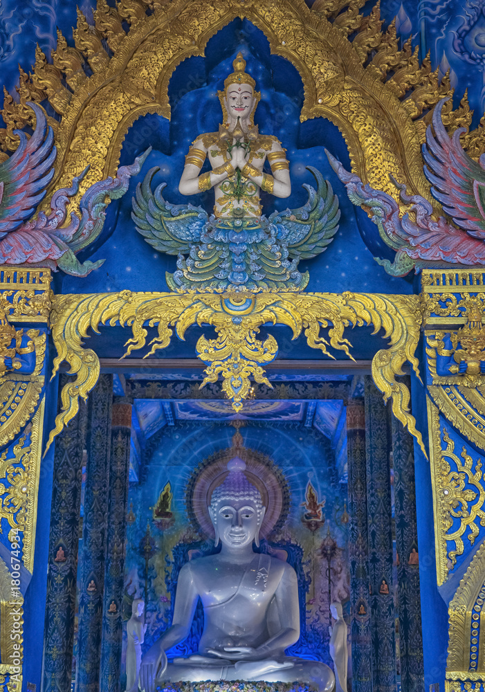 Buddha statue at the Blue Temple Chiang Rai Thailand