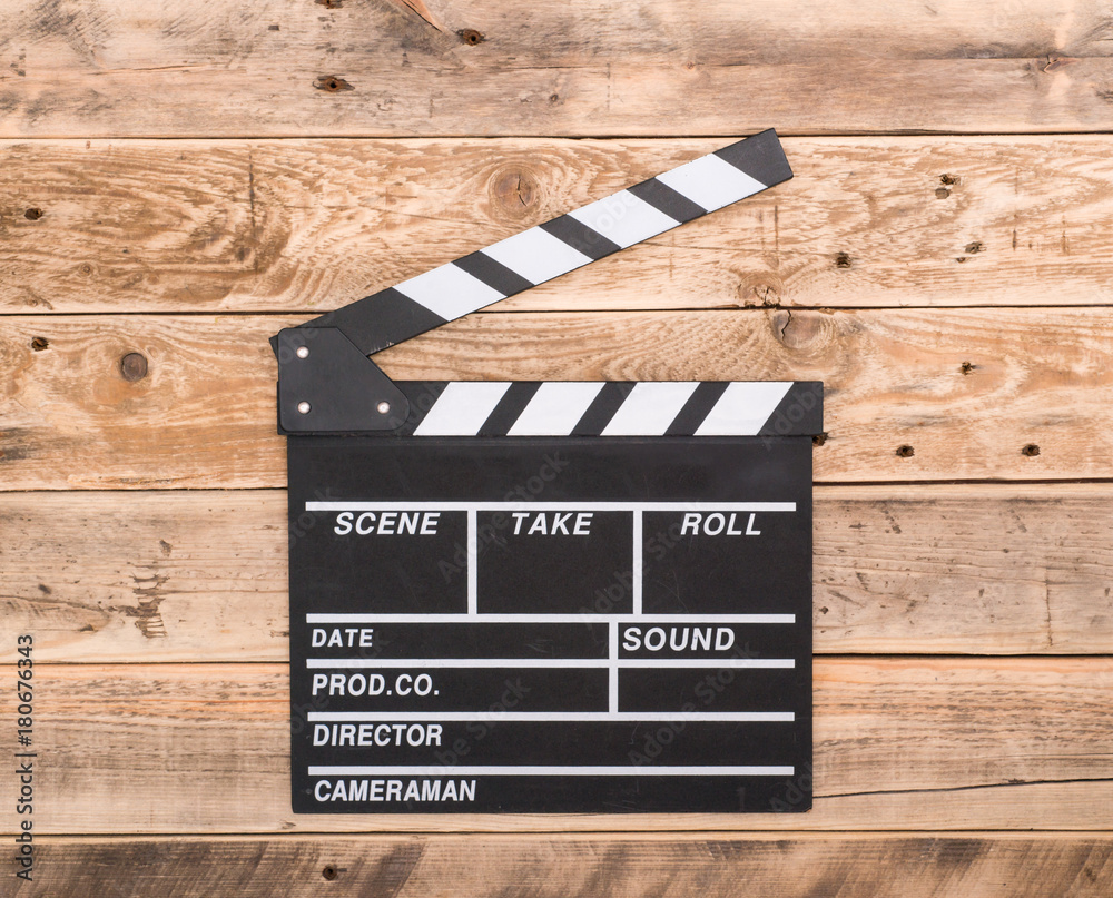 Obraz premium Clapperboard on wood background