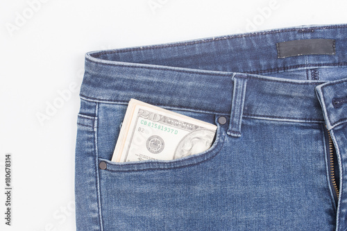 American dollar banknote in a pocket of blue jean