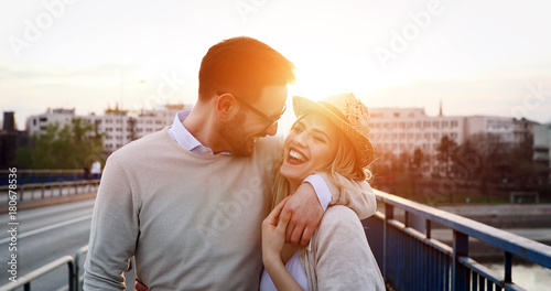 Romantic couple dating in sunset