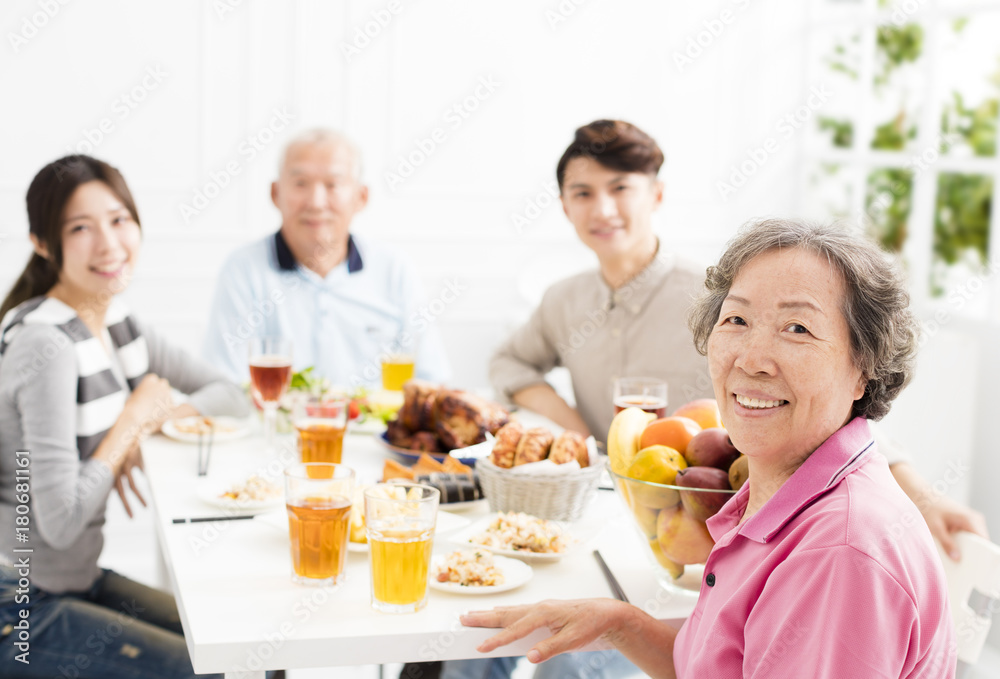 Happy asian family having dinner together Happy asian family having dinner together