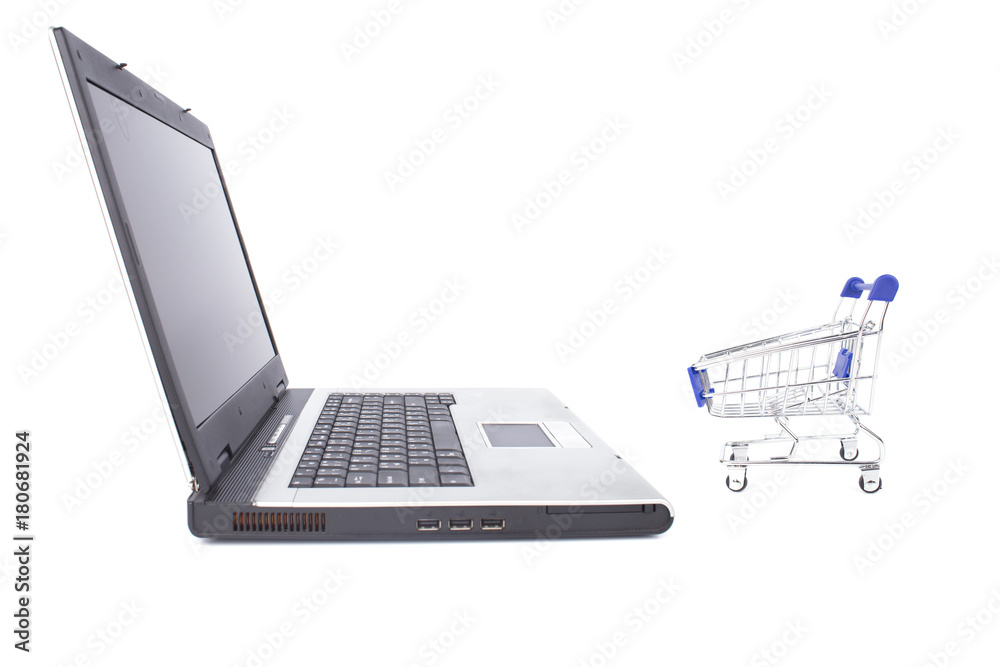 Side facing notebook or laptop and trolley on white background Side facing notebook or laptop and trolley on white background