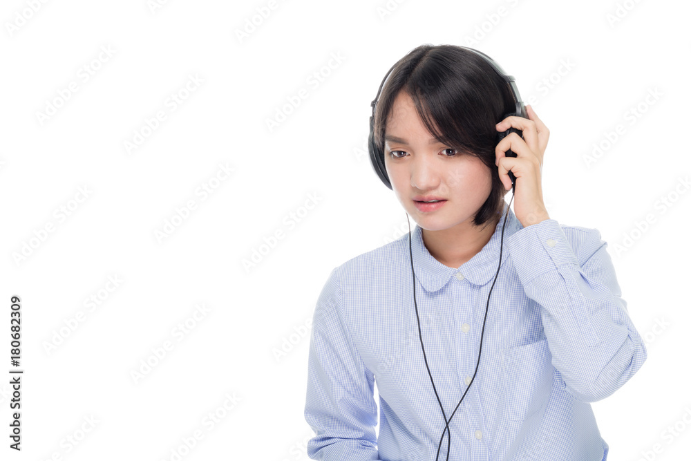 Portrait of a young business woman smiling with earbuds / headphone for listening to music or talking on smart phone. Isolated on white background Portrait of a young business woman smiling with earbuds / headphone for listening to music or talking on smart phone. Isolated on white background