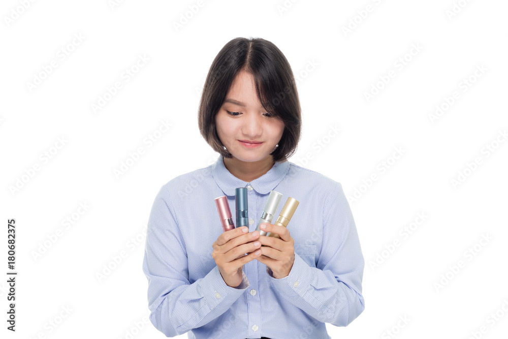 portrait of a beautiful asian businesswoman with perfume. Isolated on white background with copy space portrait of a beautiful asian businesswoman with perfume. Isolated on white background with copy space