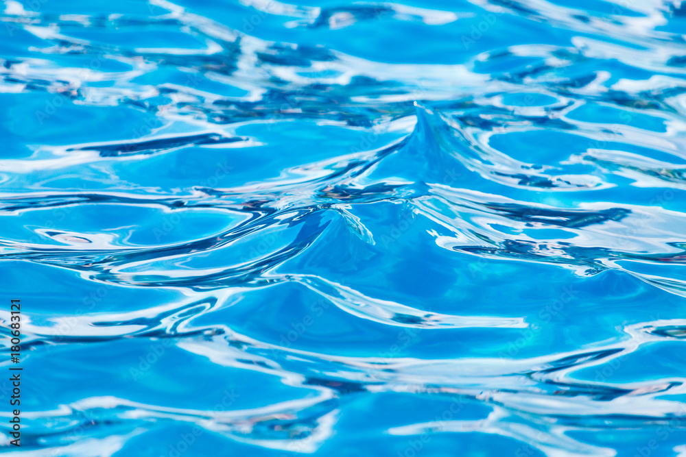 The smooth water in the pool as a background The smooth water in the pool as a background