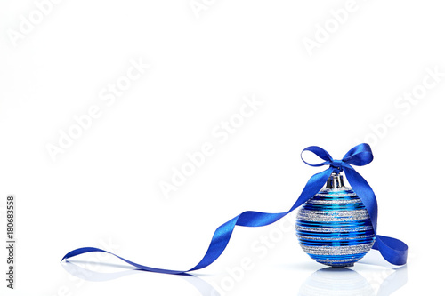 Blue Christmas ball with ribbon bow on white background photo