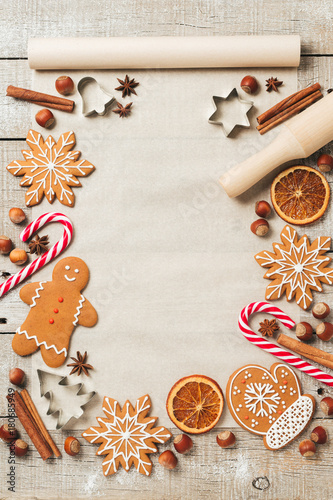 Holiday food background for baking gingerbread cookies. Vintage paper sheet for christmas recipe. Text space, top view.