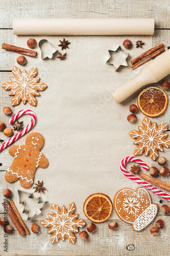Holiday food background for baking gingerbread cookies. Vintage paper sheet for christmas recipe. Text space, top view.