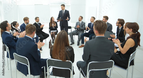 coach leads the session with the business team.