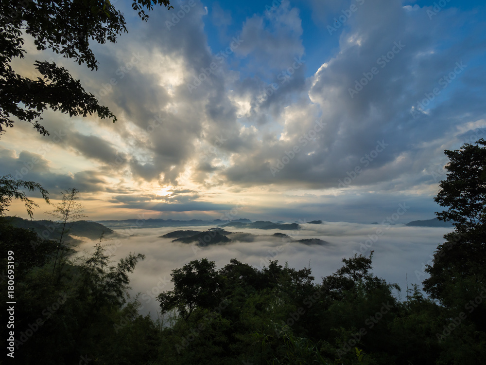 Obraz premium Mist on mountain at sunrise