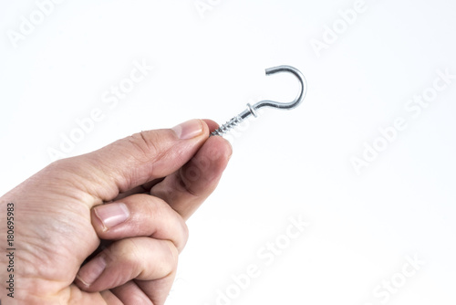 a metal clip between the fingers 