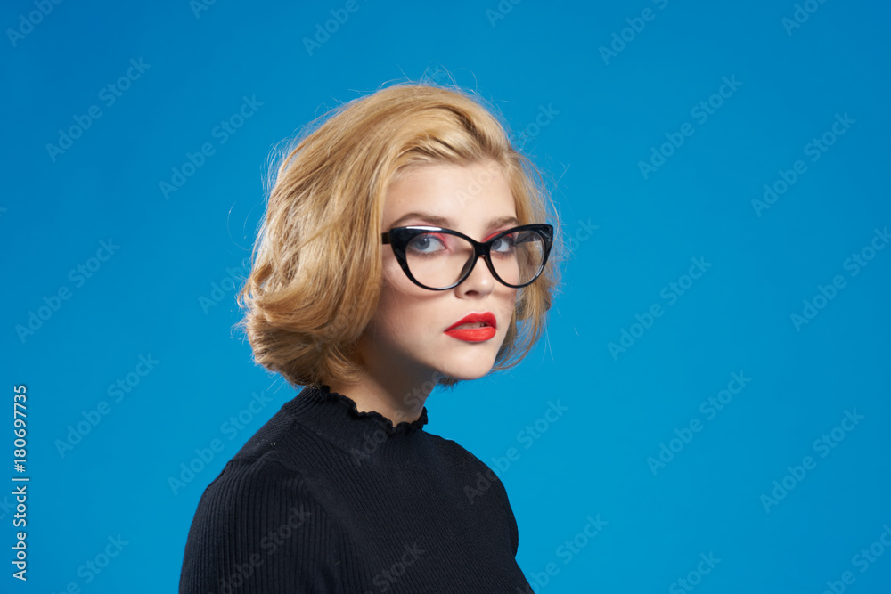 Fototapeta premium woman, glasses, blue background, close-up