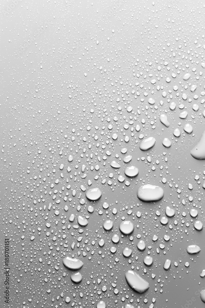 Surface with water drops, grey background Surface with water drops, grey background