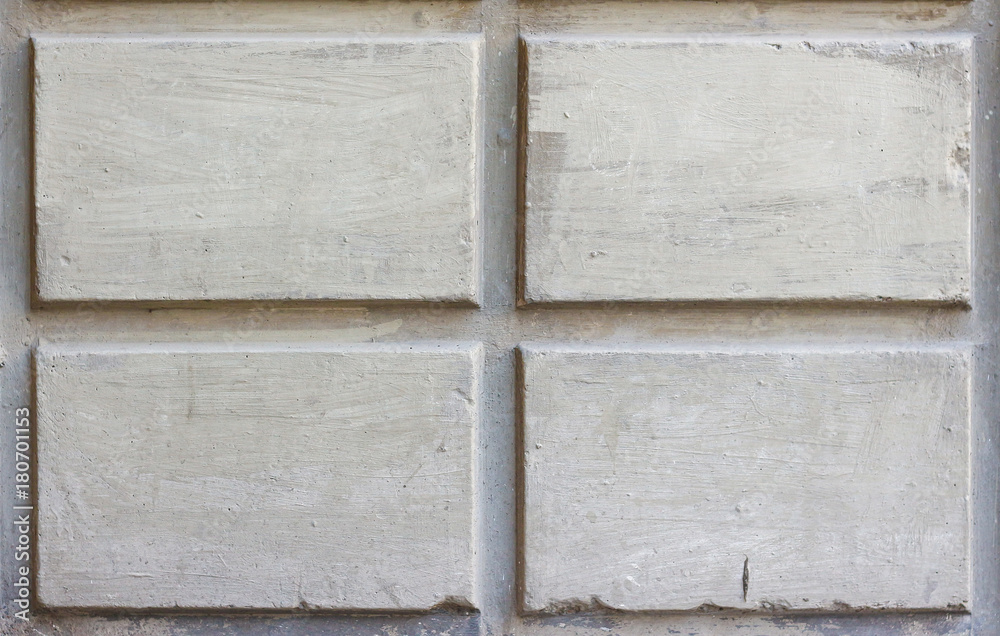 The texture of the concrete walls with rectangular shapes. Closeup