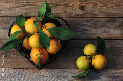 Mandarins on a wooden background
