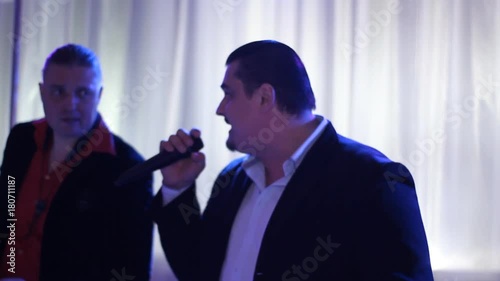 singer and sound engineer at work