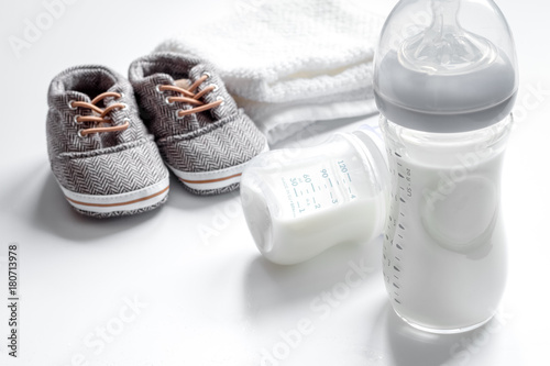 preparation of mixture baby feeding on white background