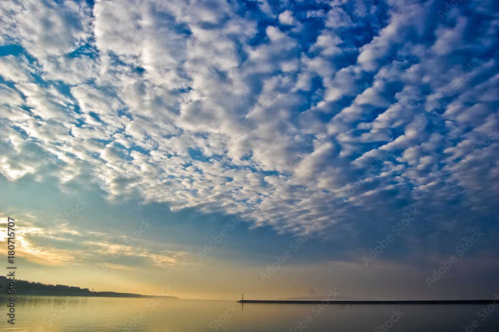 The extravaganza of clouds over the Dnieper waters.